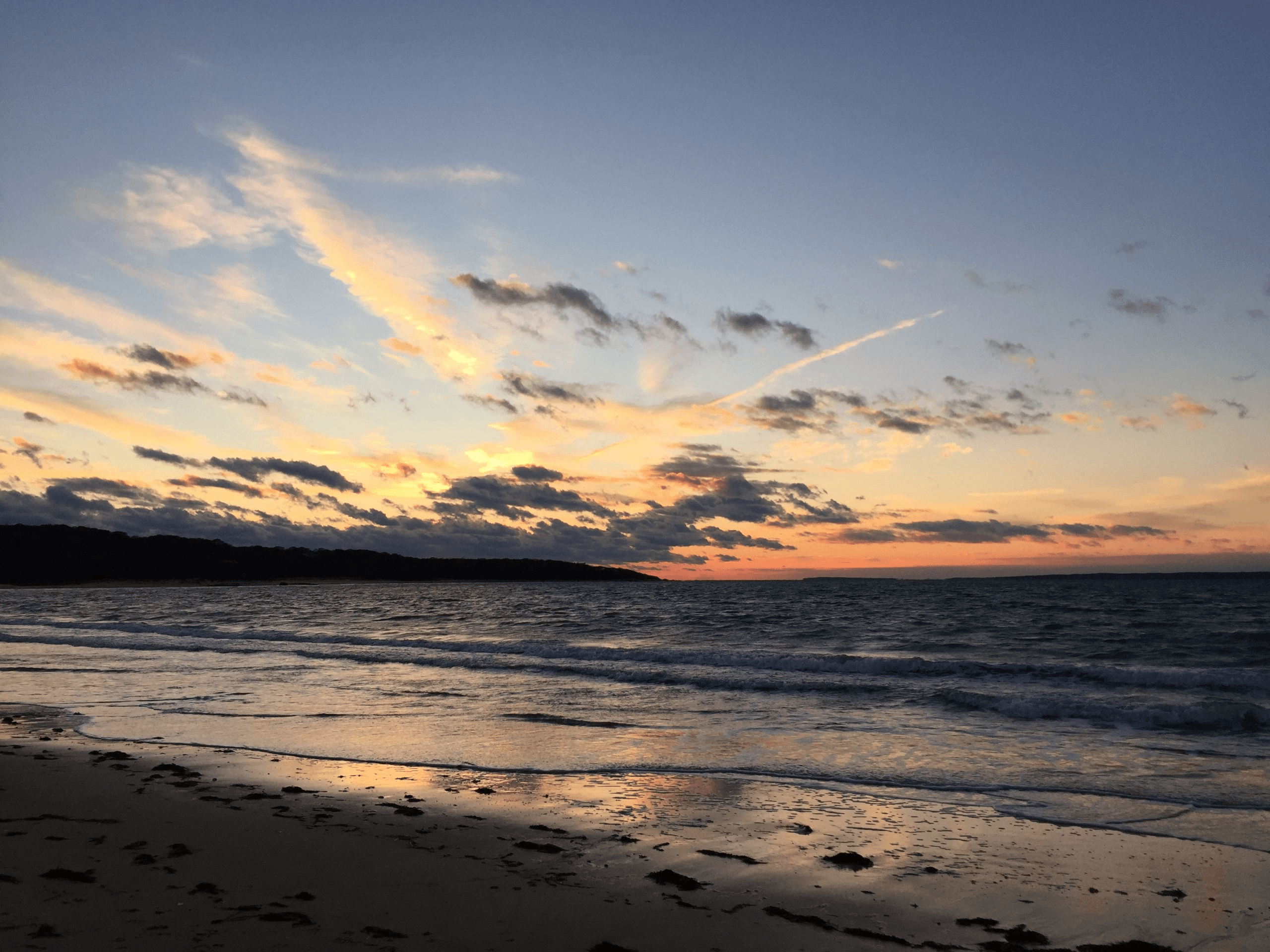 Sunset over a beach in West Tisbury in the winter